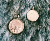 coin pendants from around the  globe.